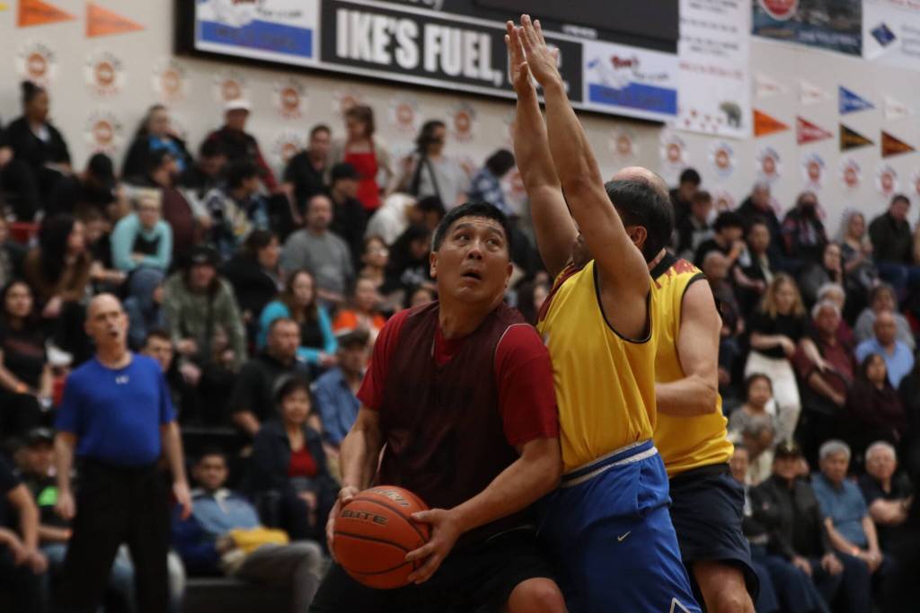 Hoonahs Kenny Willard (24) puts up a layup for 2 points against Juneau for the championship game on Saturday at JDHS for this years Gold Medal Basketball Tournament. Willard finished the game with 7 points. (Ben Hohenstatt / Juneau Empire)