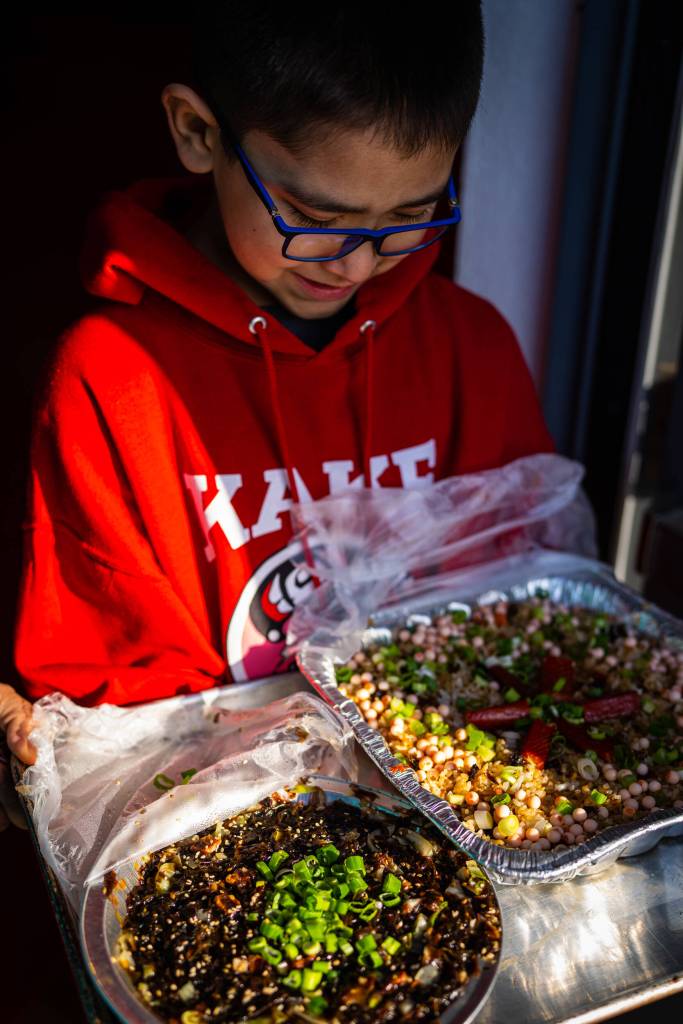 Community members of all ages brought an array of homemade foods with wild ingredients like black seaweed, smoked salmon, salmon eggs and cloudberries to enter the food competition. (Courtesy Photo / Bethany Goodrich)
