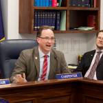 State Rep. Ben Carpenter, R-Nikiski, inquires about election legislation during a committee hearing Tuesday at the Alaska State Capitol. Carpenter, chair of the House Ways and Means Committee, is sponsoring bills to decrease business taxes and implement a 2% statewide sales tax that got hearings this week. (Mark Sabbatini / Juneau Empire)