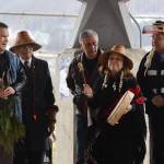 Nancy Barnes leads Tinglit, Haida and Tsimshian peoples in song and dance on Friday at Marine Park at the site where the Kootéeyaa Deiyí (Totem Pole Trail) along the downtown Juneau waterfront will be installed by April 22. (Jonson Kuhn / Juneau Empire)