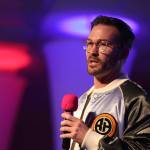 Former professional BMX race and Olympic coach Tony Hoffman speaks to a crowed in the Elizabeth Peratrovich Hall Thursday afternoon about his story of overcoming addiction. His speech marked the Final Chapter of the Pillars of America speakers series that has been put on by the Juneau Glacier Valley Rotary Club for more than three decades. (Clarise Larson / Juneau Empire)