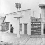 Famous Juneau photographers Lloyd Winter and Percy Pond stand in front of their studio located at the corner of Front and Franklin Streets in about 1900. Their photos document Juneaus history and were originally taken on glass plates. (Alaska State Library, P87-0981)