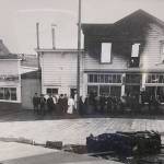 In 1906, the popular Louvre Theater burned. To its left is the location of todays Triangle Club. When this photo was taken, the corner business was the Alaska Grill, advertising oysters and chops, with its separate Ladies Entrance. (Alaska State Library Historical Collection P87-1050)