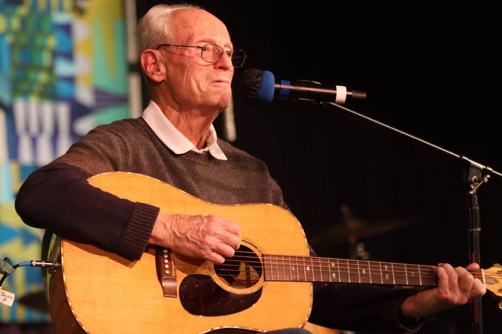 Tom Koester plays a solo set of original tunes for this years Alaska Folk Festival one day after turning 79-years-old. (Jonson Kuhn / Juneau Empire)