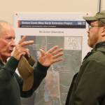 Chief civil engineer with Greens Creek Mine David Landes answers questions from the public regarding the proposed North Extension Project at Hecla Greens Creek Mine on Wednesday during an open house at the Juneau Ranger District. (Jonson Kuhn / Juneau Empire)