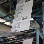 Freshly printed paper makes it way through the Juneau Empire printing press in Juneau Thursday evening. Beginning May 3, the Juneau Empire will be printed in Washington state, and delivered on Wednesdays and Saturdays. (Clarise Larson / Juneau Empire)