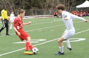 Courtesy Photo / Dana Zigmund 
JDHS junior Xavier Melancon maneuvers past a Thunder Mountain High School player on the pitch at the Adair-Kennedy field Monday evening.