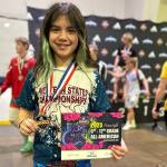 Courtesy Photo / Mel Cummins 
Dzantiki Heeni Middle School seventh-grader Nixie Schooler poses for a photo after winning this years Adidas Nationals Freestyle Wrestling Tournament in Kansas City, Missouri on April 10.