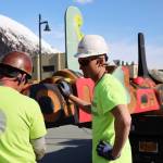 A totem pole sits on a truck bed as it awaits to be raised at Overstreet Park Sunday afternoon. The pole is one of the first 12 of 30 totem poles to be raised to create a Kootéeyaa Deiyí (totem pole trail) lining the waterfront in Juneau. (Clarise Larson / Juneau Empire)