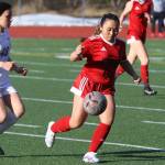 JDHS sophomore Milina Mazon (11) keeps the ball from TMHS freshman Ariana Gonzales (40) during the two schools second match up of the season on Tuesday at Adair-Kennedy Memorial Park. (Jonson Kuhn / Juneau Empire)