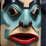 This mask titled Hla dm baanu di baalack was carved, without a planned sketch, by Tsimshian artist Huk Yuunsk David Lang. The piece was one of the many featured in a recent art gallery hosted Friday evening at the University of Alaska Southeast that showcased students work from the UAS Northwest Coast Art program. (Clarise Larson / Juneau Empire)