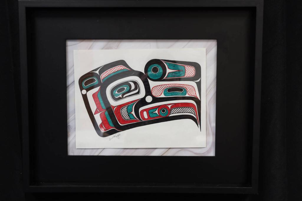 A Northwest Coast formline design by Juneau artist Alexis Pringle was one of the many featured in a recent art gallery hosted Friday evening at the University of Alaska Southeast that showcased students work from the UAS Northwest Coast Art program. (Clarise Larson / Juneau Empire)