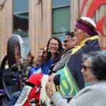 U.S. Rep. Mary Peltola, a Democrat and the first Alaska Native person to represent Alaska in Congress, laughs while sitting in the crowd at the dedication ceremony of the Kootéeyaa Deiyí, Totem Pole Trail, held Saturday in downtown Juneau at Heritage Plaza. (Clarise Larson / Juneau Empire)