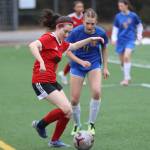 JDHS sophomore Cerys Hudson (6) makes a steal against Wheat Ridge senior Acacia Seeling (11) on Saturday at Adair Kennedy field for a non-conference game during the Colorado teams two game visit to Juneau. (Jonson Kuhn / Juneau Empire)