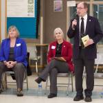 Mark Sabbatini / Juneau Empire file 
Juneau state Sen. Jesse Kiehl, standing, addresses a town hall audience Jan. 11 at Dzantiki Heeni Middle School as Juneau state Reps. Sarah Hannan, far left, and Andi Story wait their turn to discuss their priorities during the current legislative session.