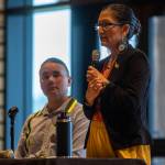 United States Secretary of the Interior Deb Haaland, right, speaks during a Road to Healing event at the Tulalip Gathering Hall in Marysville, Washington on Sunday, April 23, 2023. The tour is lead by Haaland and Department of the Interior Assistant Secretary Bryan Newland. (Annie Barker / The Herald)