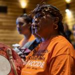Tulalip tribal members perform a welcome song during a "Road to Healing" event at the Tulalip Gathering Hall in Marysville, Washington, on Sunday, April 23, 2023. (Annie Barker / The Herald)