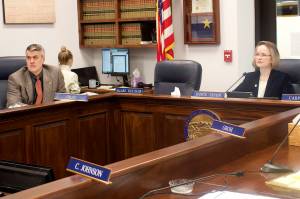 2Rep. Andrew Gray, D-Anchorage, and Sarah Vance, R-Homer, of the House Judiciary Committee listen to Alaska State Commission for Human Rights Executive Director Robert Corbisier explain why his agency is seeking changes to its name and duties, including exempting religious and other nonprofit organizations from anti-discrimination workplace rules. A bill making those changes got its first hearing by the committee Wednesday about an hour after it was introduced on the House floor. (Mark Sabbatini / Juneau Empire)