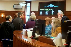 Senate President Gary Stevens, R-Kodiak, listens to a procedural discussion by senators during Fridays floor session about a bill modifying how Permanent Fund dividends are calculated. The bill, which reduce PFDs significantly from those under previously calculations unless the state has an abundance of revenue, is scheduled for further debate and a vote on Monday. (Mark Sabbatini / Juneau Empire)