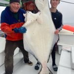 Rise Fraley, a freshman at Juneau-Douglas High School: Yadaa.at Kalé, with Joe Emerson pose for a photo on board the TommyL II with a recently caught fish. Shoreline makes it a point of employing local youth as deckhands as often as possible. (Courtesy Photo / Joe Emerson)