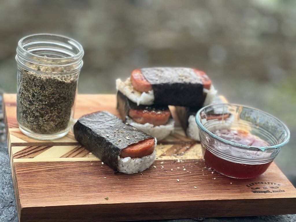 This photo shows Spam musubi with Southeast Alaskan furikake and highbush cranberry dipping sauce. (Vivian Faith Prescott / For the Capital City Weekly)