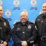 JPD Chief Ed Mercer, Officer Kevin Fermin and Deputy Chief David Campbell pose for a group photo on Friday during Fermins retirement ceremony at the Juneau Police Department. (Jonson Kuhn / Juneau Empire)