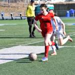 JDHS sophomore Cerys Hudson (6) takes the ball down field against North Pole High School on Saturday for the Bears last of three non-conference games in Anchorage. (Courtesy Photo / Matt Dusenberry)