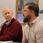 Juneau Economic Development Council Executive Director Brian Holst (left) and board member Garrett Schoenberger (right) give a presentation to the City and Borough of Juneau Assembly at its Finance Committee meeting Wednesday evening. Community groups were invited to give presentations that explained their community funding requests sent to the Assembly for the Fiscal Year 2024 budget. (Clarise Larson / Juneau Empire)