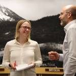 City and Borough of Juneau Assembly member Carole Triem and Deputy City Manager Robert Barr chat during a break at the Wednesday night Finance Committee meeting. Community groups were invited to give presentations that explained their community funding requests sent to the Assembly for the Fiscal Year 2024 budget. (Clarise Larson / Juneau Empire)