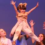 Delia Grimes,7, plays the part of Toto in this years rendition of The Wizard of Oz, which has a cast consisting of both JDHS and TMHS students and is performed at the JDHS auditorium. (Jonson Kuhn / Juneau Empire)