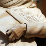 This photo available under a Creative Commons license shows a statue of Julian of Norwich holding her book Revelations of Divine Love. (Leo Reynolds / Flickr)