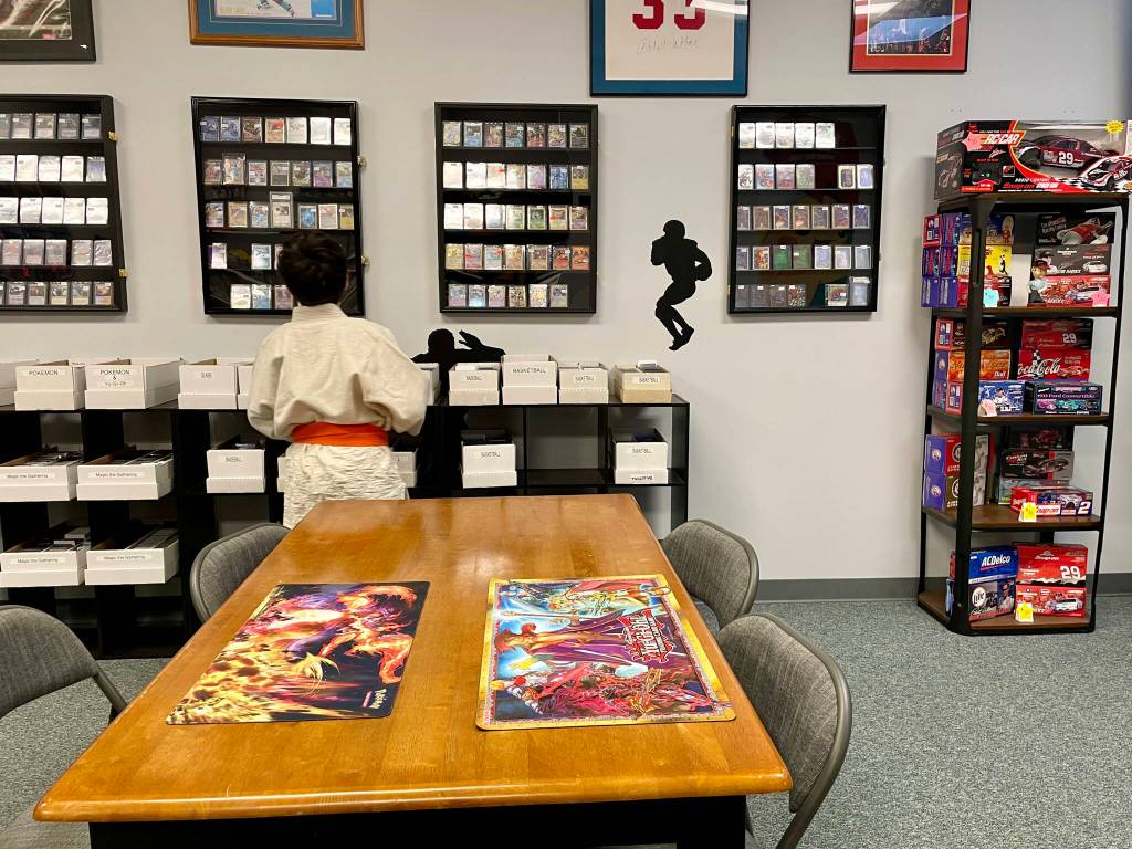 Capital City Judo Club students peruse Coops Collectibles. (Lauren Cusimano / For the Capital City Weekly)