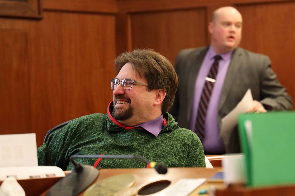 State Sen. Robert Myers, R-North Pole, smiles after his bill requiring the University of Alaska to provide online disclosure of textbook and other related course materials passed the Senate on Friday by a 19-1 vote. (Clarise Larson / Juneau Empire)