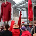 Hundred of people hold signs as they walk from the Alaska State Capitol Friday evening down Seward Street for a rally and march to recognize Missing and Murdered Indigenous Peoples Awareness Day held each year on May 5. (Clarise Larson / Juneau Empire)
