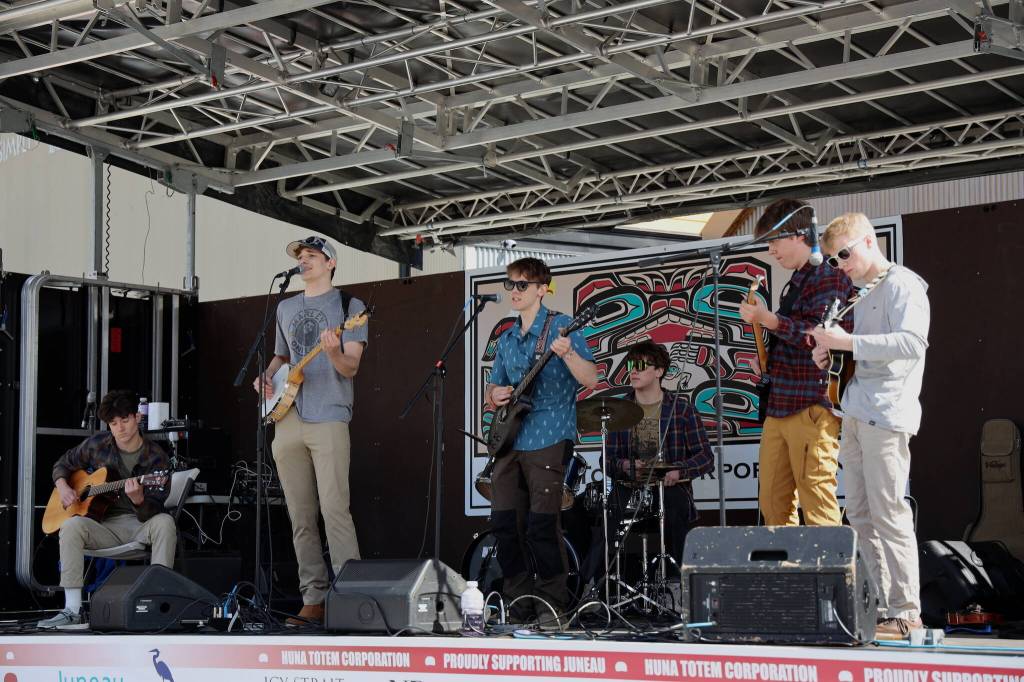 From left to right, seniors Eli Crupi, Lake Bartlett, Aidan Kovach, Brandon Campbell, Jack Schwarting and Finn Kesey perform on stage during the 2023 Juneau Maritime Festival Saturday afternoon at the Elizabeth Peratrovich Plaza. The band, known as the Radio Flyers, have been playing together since they were in the 5th grade. The performance Saturday was one of the bands last together before the members leave for college. (Clarise Larson / Juneau Empire)