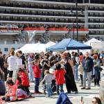 Hundreds of people gather near the stage during 2023 Juneau Maritime Festival Saturday afternoon at the Elizabeth Peratrovich Plaza. The event featured multiple musical performances by local bands and singers. (Clarise Larson / Juneau Empire)