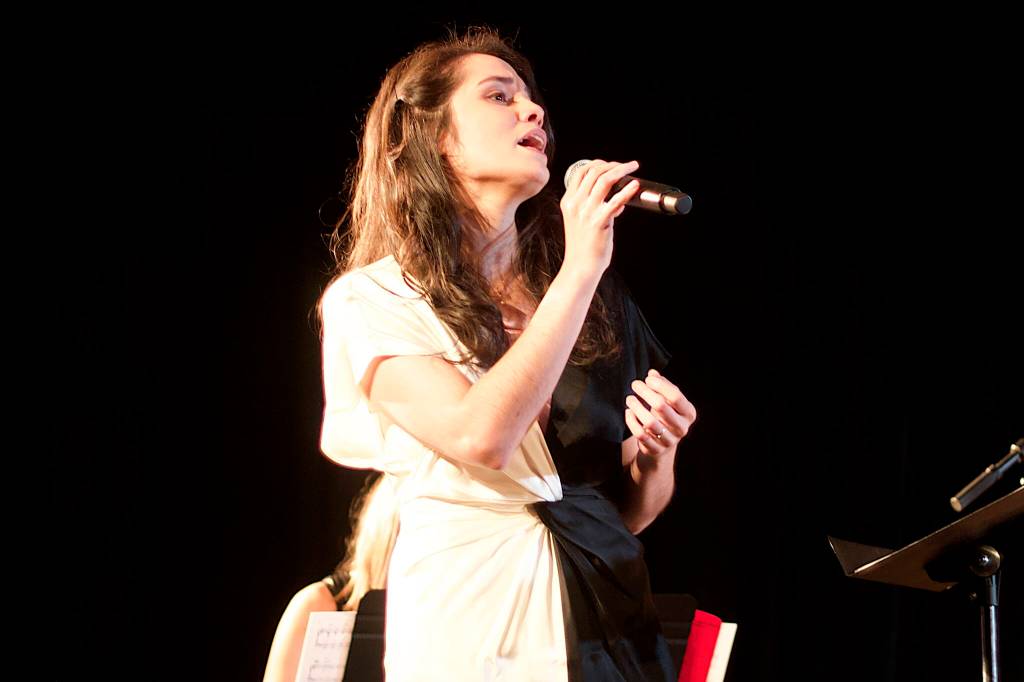 Julia Keefe sings a jazz standard made famous by Mildred Bailey, a Native American singer who rose to prominence in the 1920s, during the concert by her Indigenous Big Band on Friday night at Elizabeth Peratrovich Hall. She is also scheduled to perform with a quintet Saturday and Monday at Crystal Saloon. (Mark Sabbatini / Juneau Empire)