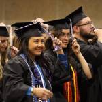 Elizabeth Autumn Dawn Ferguson switches her tassel alongside other students to signify their status as graduates at the commencement ceremony for University of Alaska Southeast Sunday afternoon. (Clarise Larson / Juneau Empire)