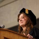 Student speaker Kali Spencer, who received her Bachelors of Liberal Arts in Interdisciplinary Studies, shares memories and advice to fellow graduates at the 2023 University of Alaska Southeast commencement ceremony Sunday afternoon. (Clarise Larson / Juneau Empire)