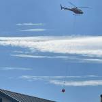 TEMSCO crews work to extinguish a grass fire south of Wren Drive on Saturday after it was determined that the location was inaccessible to CCFR vehicles. (Courtesy Photo / CCFR Facebook)
