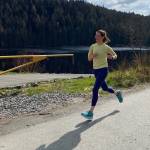 Eliza Dorn, 39, finishes the 7.5-mile run in the Magnificent Mendenhall Mudpuddle Meet on Saturday. (Courtesy Photo / Quinn Tracy/ Heather Parker)