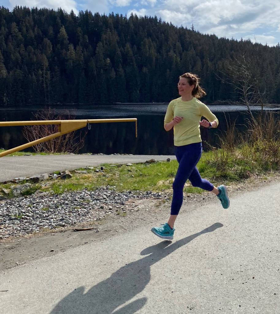 Eliza Dorn, 39, finishes the 7.5-mile run in the Magnificent Mendenhall Mudpuddle Meet on Saturday. (Courtesy Photo / Quinn Tracy/ Heather Parker)