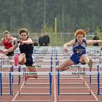 Petersburg High School sophomore Izabelle Ith, left, and Thunder Mountain junior Naomi Welling lead the field in the girls 100-meter hurdles finals at the 2015 Capital City Invitational. (Klas Stolpe / Juneau Empire)