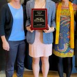 Izabelle Ith, center, holds her ASAA Hall of Fame plaque with friend Jo Ann Day, left, and mother Marketa Ith, right, on Sunday at the Hall of Fame induction ceremony. (Courtesy Photo / Tommy Thompson)