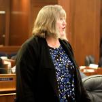 Rep. Sara Hannan, D-Juneau, speaks in opposition to the nomination of Adam Crum as the commissioner of the Department of Revenue, due to his previous job when he was commissioner of a department that since last September has been dealing with a severe backlog of processing food stamp applications. (Mark Sabbatini / Juneau Empire)