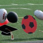 Decorations float near the pitch on Tuesday during JDHS senior celebrations. (Klas Stolpe / Juneau Empire)