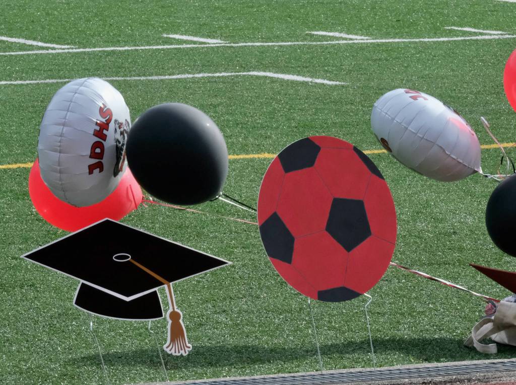 Decorations float near the pitch on Tuesday during JDHS senior celebrations. (Klas Stolpe / Juneau Empire)