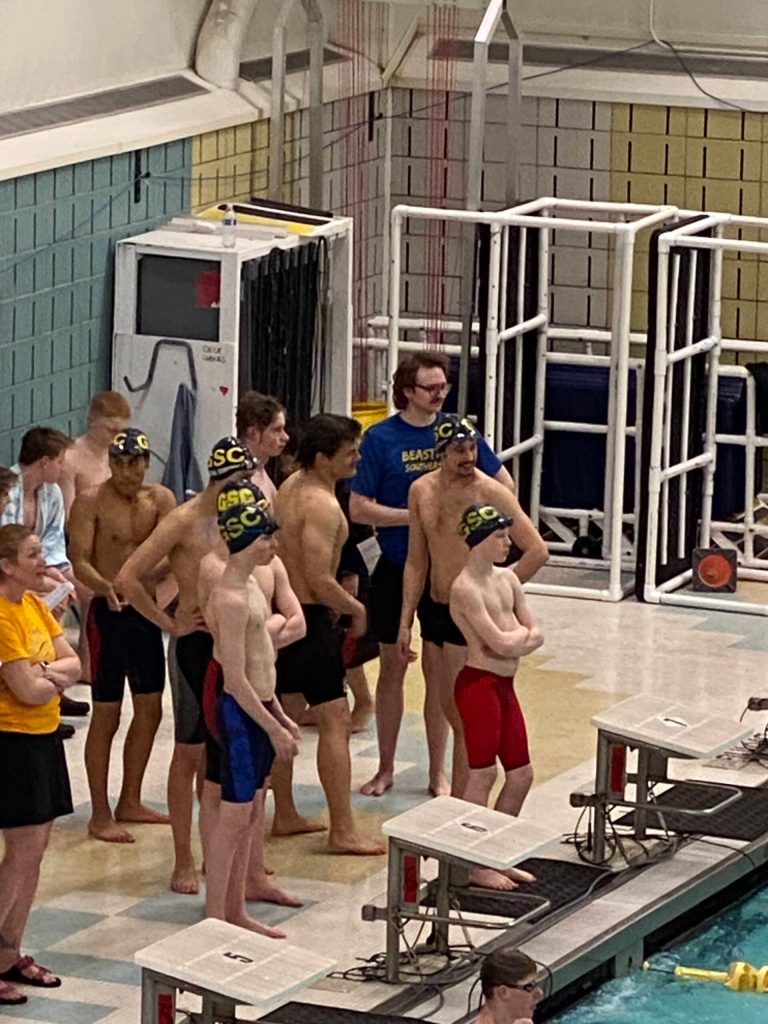 Glacier Swim Club boys warming up for the meet at this years Alaska Swimming State Championship in Anchorage: Andrew Sanders, Liam Kiessling, Clive Mateo, Chris Degener, Chaz Van Slyke, Josh Edwards, Sven Rasmussen, Levi Phelps coach Josiah Loseby. (Courtesy Photo / Savona Kiessling)