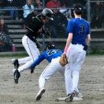 Thunder Mountain second baseman Madden Mendoza (22) tags out Juneau-Douglas High School: Yadaa.at Kalé baserunner Brandon Casperson on a steal attempt as shortstop Kasen Ludeman (3) backs up the play during the Falcons 9-6 win over the Crimson Bears on Tuesday at Adair Kennedy Field. (Klas Stolpe / Juneau Empire)