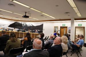 Residents and community leaders fill the Assembly chambers during the City and Borough of Juneau Assembly Finance Committee meeting Wednesday night. The Assembly made decisions on what community funding requests would receive funding and what would not. (Clarise Larson / Juneau Empire)